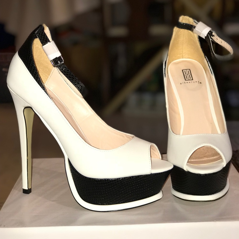 White and black platform heels